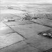 General oblique aerial view centred on the village, taken from the SW.