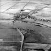 Oblique aerial view centred on the village, taken from the ENE.