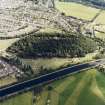 Oblique aerial view centred on the cemetery, taken from the W.