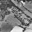 Castle Leod.
Oblique aerial view, taken from the SSW, showing the tower-house, a possible golf course and the gate lodge.