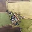 Oblique aerial view centred on the farmsteading, taken from the WSW.