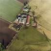 Oblique aerial view centred on the farmsteading, taken from the S.