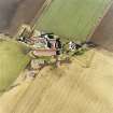 Oblique aerial view centred on the farmsteading, taken from the ESE.