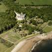 Aerial view of Dunrobin Castle, walled garden and formal gardens, taken from the SW.