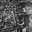 Aerial view showing Canongate at bottom of photograph, Cowgate to left, Lawnmarket at top and Waverley Station to right