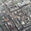 General oblique aerial view of the Cowgate centred on the remains of the buildings demolished after the fire of 7 December 2002, taken from the N.
