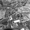 Oblique aerial view of Edinburgh centred on Fountainbridge, taken from the S.