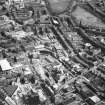Oblique aerial view of Edinburgh centred on Fountainbridge, taken from the W.
