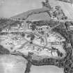 Oblique aerial view centred on the hospital before redevelopment, taken from the S.