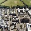 Oblique aerial view centred on the hospital, taken from the N.