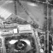 Oblique aerial view centred on the library with George Square, University buildings and Meadows adjacent, taken from the NNW.