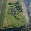 Oblique aerial view of Jarlshof from NW.