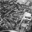 Oblique aerial view of Edinburgh centred on Merchiston.
