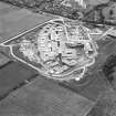 Oblique aerial view centred on the hospital under construction, taken from the N.