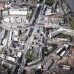 Oblique aerial view of Leith centred on Great Junction Street and Crabbies Winery, taken from the SE.