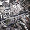 Oblique aerial view of Leith centred on Great Junction Street and Crabbies Winery, taken from the ENE.