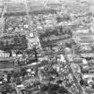 Aerial view of centre of Edinburgh including Princes Street and the New Town at top of photograph, Waverley Station and St Giles on right, Candlemaker Row at bottom and Castle Esplanade at left
