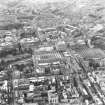 Oblique aerial view of centre of Edinburgh including Princes Street and the New Town at top of photograph, Waverley Station to right, Cowgate, Solicitors' Library at bottom and Bank of Scotland on The Mound to left.