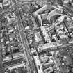 Oblique aerial view of Edinburgh centred on the St Andrew's Square Bus Station before demolition, taken from the W.