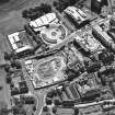 Oblique aerial view centred on the Scottish Parliament under construction with 'Our Dynamic Earth' adjacent, taken from the N.