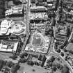 Oblique aerial view centred on the Scottish Parliament under construction with 'Our Dynamic Earth' adjacent, taken from the NE.