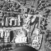 Oblique aerial view centred on the construction of the Scottish Parliament with the exhibition centre and palace adjacent, taken from the SSE.