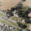 Dalmeny village and Dalmeny Parish Church, oblique aerial view.