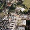 Oblique aerial view centred on the construction of the Scottish Parliament with Our Dynamic Earth, Queensbury House and Holyrood Palace adjacent, taken from the WSW.