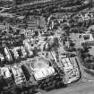 Oblique aerial view centred on the construction of the Scottish Parliament with the exhibition centre and palace adjacent, taken from the S.
