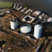 Oblique aerial view centred on the gasworks, taken from the SE.