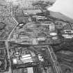 Oblique aerial view centred on the gasworks, taken from the E.