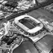 Aerial view showing Murrayfield Stadium and Roseburn House.