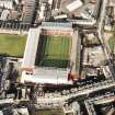 Oblique aerial view of Edinburgh centred on Tynecastle Park Stadium, taken from the SSE.