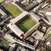 Oblique aerial view of Edinburgh centred on Tynecastle Park Stadium, taken from the SE.