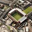 Oblique aerial view of Edinburgh centred on Tynecastle Park Stadium, taken from the NE.