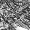 Oblique aerial view of Edinburgh centred on Fountainbridge, taken from the WNW.