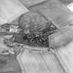 Oblique aerial view centred on the remains of an anti-aircraft battery, taken from the SSE.