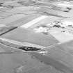 Oblique aerial view of Drem Airfield centred on the remains of the airfield, taken from the SE.