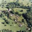 Aerial view of Coulston House, gardens, stables and dovecot, taken from the NW.