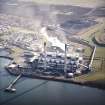 Oblique aerial view centred on the power station and coal store, taken from the WNW.