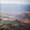 General oblique aerial view looking across the village and the Firth of Forth towards the Lomond Hills, taken from the SSE.