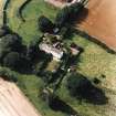 Oblique aerial view centred on the country house with garden adjacent, taken from the ESE.