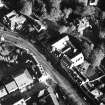 Oblique aerial view of Penicuik, 33 High Street, Cowan Institute centred on office, taken from the W.