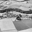 Oblique aerial view centred on the village, taken from the SE.