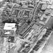 Oblique aerial view centred on the remains of the works, taken from the WSW.