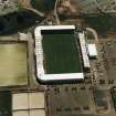 Oblique aerial view centred on the football stadium, taken from the N.