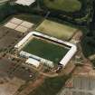 Oblique aerial view centred on the football stadium, taken from the SW.