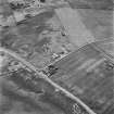 Hoy, Doonatown, oblique aerial view, taken from the E, centred on The Garrison Theatre, Lyness Military Headquarters and Camp, and a ruined farmstead.