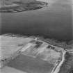 Hoy, Crockness, oblique aerial view, taken from the SW, centred on the Martello Tower and a curving linear soilmark.