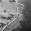 Hoy, Crockness, oblique aerial view, taken from the SE, centred on the Martello Tower. A curving linear soilmark is visible in the bottom left hand corner of the photograph.